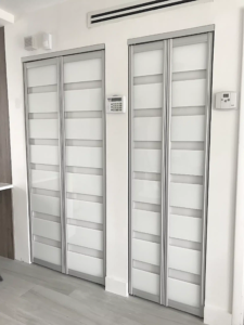 ACBF-12 – AC Bifold Door – White Glass – Silver Frame