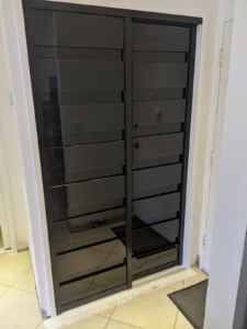 ACSD- 02- AC Two Panels Sliding Door – Black Acrylic – Black Frame