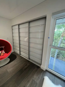 ACSD- 04- AC Three Panels Sliding Door – White Glass – Silver Frame.