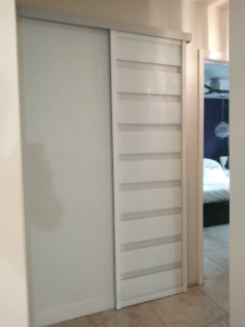 ACWH-01 - AC Wall Hanging Door - White Glass - White Frame ACWH-01 - AC Wall Hanging Door - White Glass - White Frame